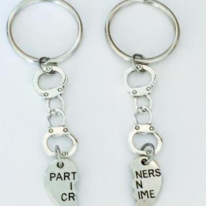 - Set Of 2 Partners In Crime Keychain, Handcuff..